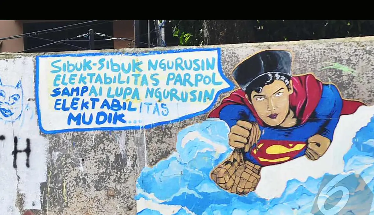 Salah satu coretan dinding bergambar Superman yang ingin mudik di dinding tanggul Sungai Ciliwung, Jalan Latuharhary, Jakarta, Minggu (27/7/2014) (Liputan6.com/Faizal Fanani)