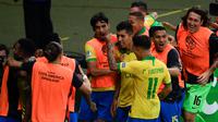 Pemain Brasil merayakan gol Roberto Firmino ke gawang Argentina pada semifinal Copa America 2019 di Estadio Governador Magalhaes Pinto, Minas Gerais, Rabu (3/7/2019) pagi WIB. (AFP/Mauro Pimentel)