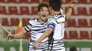 Korea Selatan berhasil menjadi negara ke-15 sekaligus wakil Asia ke-3 yang lolos ke Piala Dunia 2022 di Qatar usai mengalahkan Suraih dengan skor 2-0. (AFP/Karim Sahib)