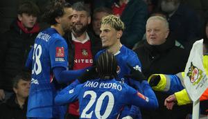 Skuad Chelsea merayakan gol Alejandro Garnacho ke gawang Wrexham, Minggu (8/3/2026) (AP Photo/Jon Super)