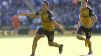 Alexis merayakan gol ke gawang Leicester (Reuters)