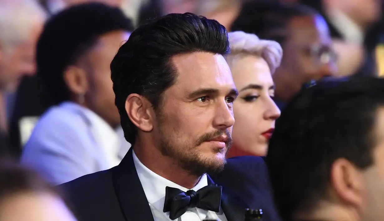 Aktor James Franco menghadiri acara penghargaan Screen Actors Guild (SAG) Awards di Los Angeles, Minggu (21/1). Padahal belakangan ini Franco memilih ‘bersembunyi’ setelah mendapat kecaman atas pelecehan seksual. (Christopher Polk/Getty Images/AFP)