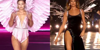 Gigi Hadid muncul sebagai pembuka. Ibu Khai itu tampil memukau bergaya ala soft-girl. Ia mengenakan lingerie sutra berwarna pink, sepatu hak bertali warna perak, dan sayap warna pink yang besar. [@runway.dolls]