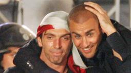 Gialuigi Buffon pernah merasakan gelar Piala Dunia pada 2006. Italia berhasil mengalahkan Prancis lewat adu penalti pada final dengan skor 5-3. (AFP/Paco Serinelli)