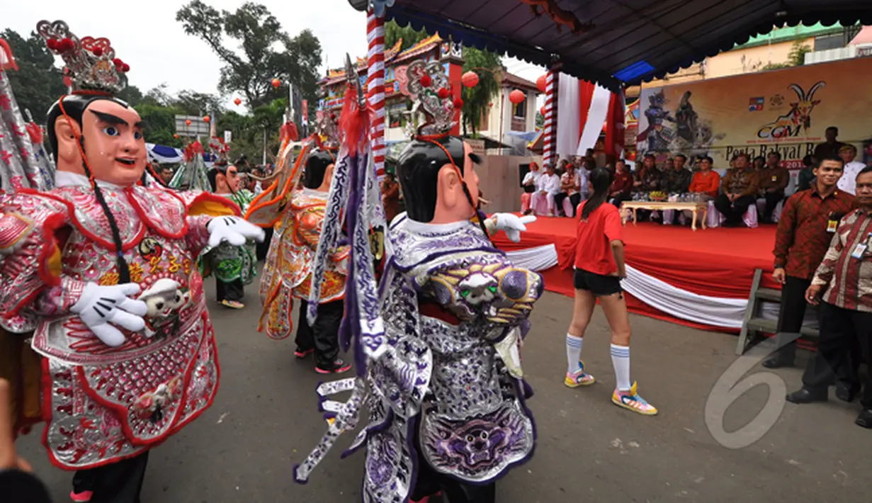 Suasana kemeriahan acara perayaan Cap Go Meh di Kota Bogor, Jawa Barat, Kamis (5/3/2015). (Liputan6.com/Faizal Fanani)