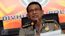  Kabagpenum Humas Polri Kombes Pol Martinus Sitompul menyampaikan keterangan di Mabes Polri, Jakarta, Jumat (24/3). Martinus juga menyampaikan kronologis penangkapan terduga teroris di Ciwandan, Cilegon, Banten. (Liputan6.com/Helmi Fithriansyah)
