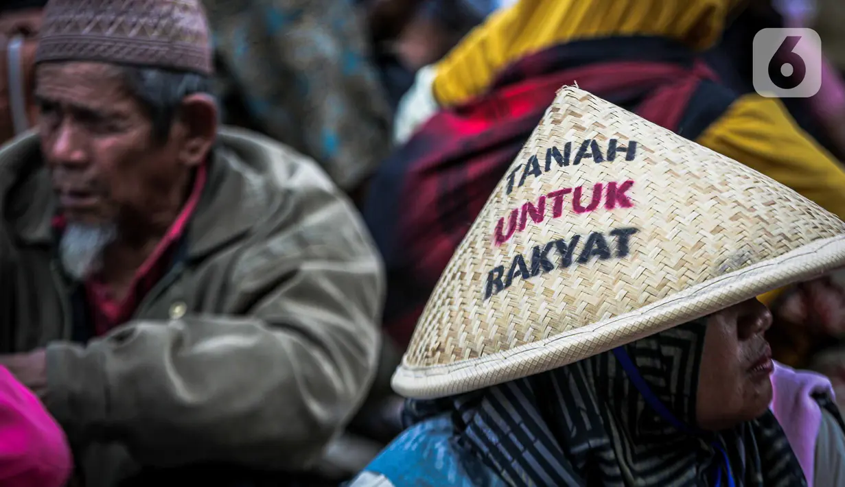 Massa Partai Buruh dan Serikat Petani menggelar aksi unjuk rasa di kawasan Patung Kuda, Jakarta, Selasa (26/3/2023). (Liputan6.com/Faizal Fanani)