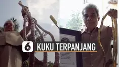 Pria ini memiliki panjang kuku 909,6 cm di tangan kiri.
