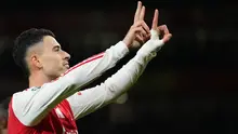Selebrasi pemain&nbsp;Arsenal, Gabriel Martinelli dalam laga Liga Champions versus Atletico Madrid, Rabu (22/10/2025). (AP Photo/Alastair Grant)