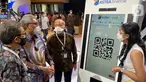 Presiden Komisaris Astra Priyono Sugiarto, Anggota Dewan Komisioner OJK Riswinandi dan Direktur Astra Suparno Djasmin, mencoba permainan virtual di booth Astra Financial & Logistic pada pameran GIIAS 2021 di ICE BSD, Serpong Tangerang Kamis (11/11/2021). (Liputan6.com/HO/Astra Financial)