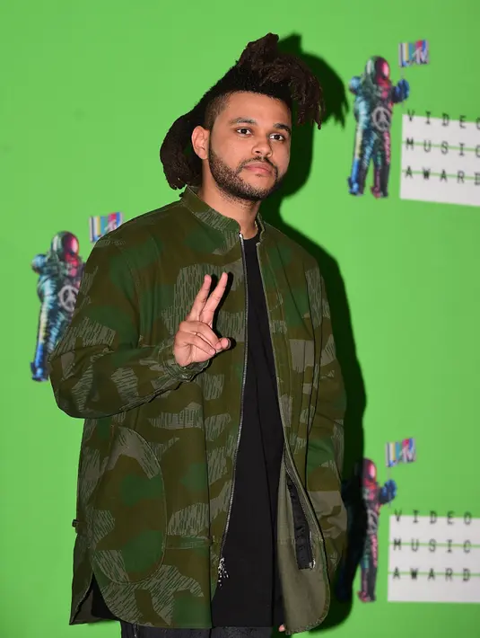 The Weeknd baru saja mencatatkan prestasi dengan menyabet posisi pertama di chart musik Amerika. (AFP/Bintang.com)