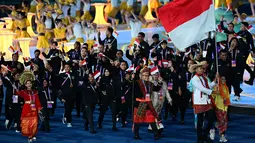 Kontingen Indonesia yang berkekuatan 413 atlet mengusung konsep keberagaman budaya lewat semboyan Bhineka Tunggal Ika. (Ishara S.KODIKARA / AFP)