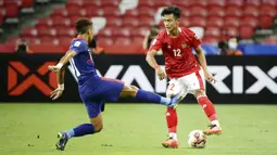 Pratama Arhan - Pelatih Shin Tae-yong telah memastikan bahwa tidak bisa menurunkan bek kiri utama, Pratama Arhan, pada leg pertama final Piala AFF 2020 kontra Thailand. (AP/Suhaimi Abdullah)