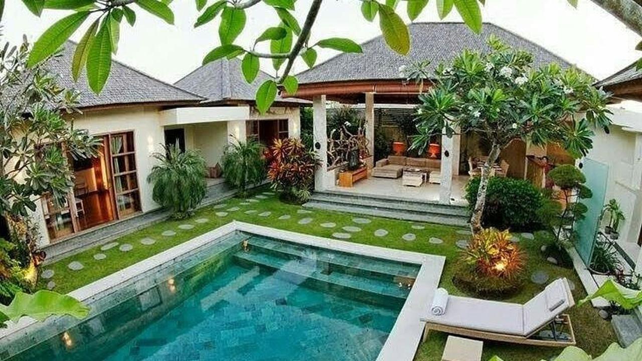 4. Rumah Tropis Modern dengan Kolam Renang