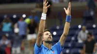 Petenis Serbia, Novak Djokovic, lolos ke babak ketiga AS Terbuka 2016, Kamis (1/9/2016), tanpa perlu bertanding. (EPA/Andrew Gombert)
