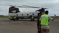 Helikopter milik BNPB yang bantu penanganan Covid-19 dan bencana di Sumbar. (Liputan6.com/ Novia Harlina)