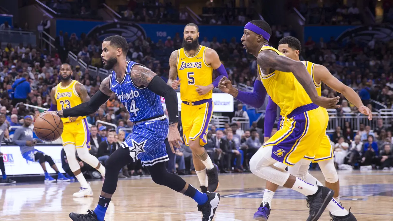 Aksi point guard Magic DJ Augustin saat melawan Lakers di ajang NBA