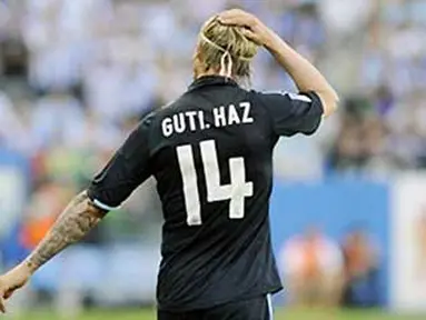 Ekspresi gelandang Real Madrid Guti. AFP PHOTO / CRISTINA QUICLER