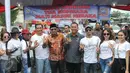 Pelawak Srimulat, Kabul Basuki atau Tessy (topi merah) beserta sejumlah kalangan saat mengkampanyekan untuk tidak memakai Narkoba di Lapangan Kota Tua, Jakarta, Jumat (26/2).(Liputan6.com/Gempur M Surya)