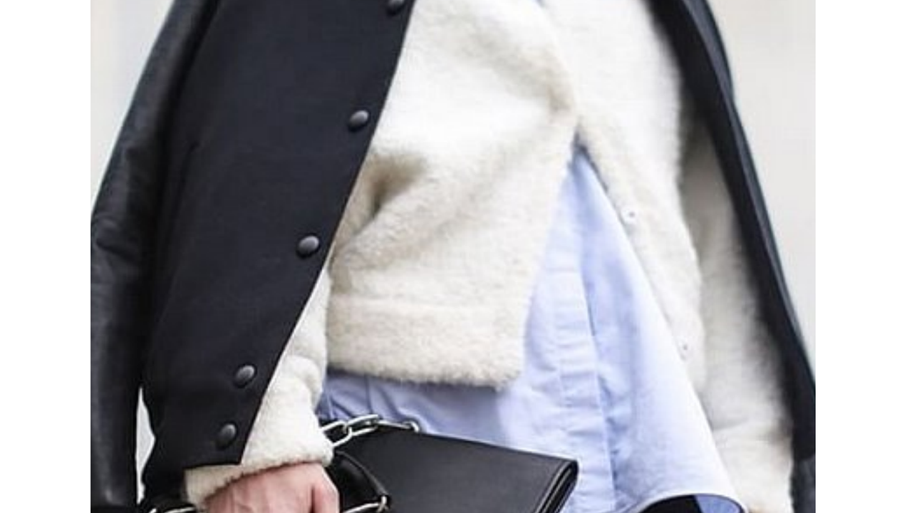 T-shirt Beneath a Fuzzy Sweater and Varsity Jacket