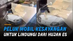 Nampak pria itu mondar-mandir sambil menyandarkan badannya ke mobil dan merentangkan tangannya.
