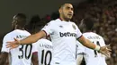 9. Dimitri Payet (West Ham) - 6 gol dan 14 assist, total 20. (AFP/Lindsey Parnaby)