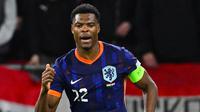 Belanda baru bisa membobol gawang Hungaria pada menit ke-83 lewat gol Denzel Dumfries. (Attila KISBENEDEK/AFP)