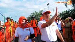 Walikota Tangerang Arief R Wismansyah bersama istri, Rabu (23/4/2014) (Liputan6.com/Faisal R Syam).