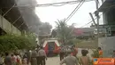 Citizen6, Jakarta: Mobil pemadam kebakaran telah berada di lokasi terjadinya kebakaran di teluk angke. (Pengirim: Alexander) 