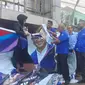 DPC Partai Demokrat merasa kecewa dengan melampiaskan menurunkan baliho dan merobek gambar Anies Baswedan bersama Agus Harimurti Yudhoyono (AHY), Jalan Tole Iskandar, Kota Depok.