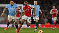 Lima menit kemudian atau pada menit ke-62, Myles Lewis-Skelly sukses menggandakan keunggulan Arsenal atas Manchester City. (Glyn KIRK/AFP)