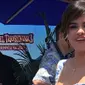 Selena Gomez terlihat ceria dengan suasana musim panas di acara pemutaran film Hotel Transylvania 3. (Twitter/@marcmalkin)