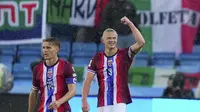 Striker Norwegia, Erling Haaland, merayakan golnya ke gawang Italia di Ullevaal Stadion, Sabtu (07/06/2025). (Spada/LaPresse via AP)