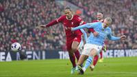 Liverpool dan Manchester City harus puas bermain imbang 1-1 pada laga pekan ke-28 Premier League di Stadion Anfield, Minggu (10/3/2024) malam WIB. (AP Photo/Jon Super)