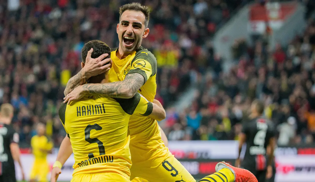 Paco Alcacer. Pada musim 2018/2019, pemain yang mewarisi jersey nomor 9 yang ditinggalkan Andriy Yarmolenko adalah Paco Alcacer yang dipinjam dari Barcelona. Bertahan 1,5 musim, ia tampil 47 laga dengan mencetak 26 gol dan 4 assist. Ia pergi usai kedatangan Erling Haaland. (AFP/DPA/Rolf Vennenbernd)