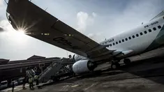 Pesawat Garuda Indonesia disiapkan di Bandara I Gusti Ngurah Rai, Denpasar, Bali, Jumat (24/10/2014), untuk penerbangan perdananya dengan tujuan Dili, Timor Leste. (Antara Foto/Rosa Panggabean)
