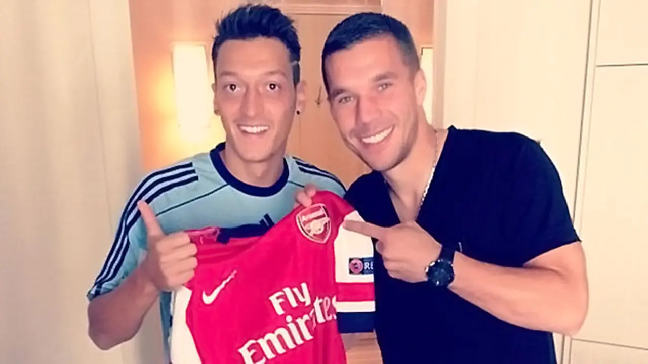 ozil-podolski-130905c.jpg