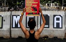 FOTO: Aksi Ribuan Aktivis Perempuan Unjuk Rasa Peringati Hari Perempuan Internasional