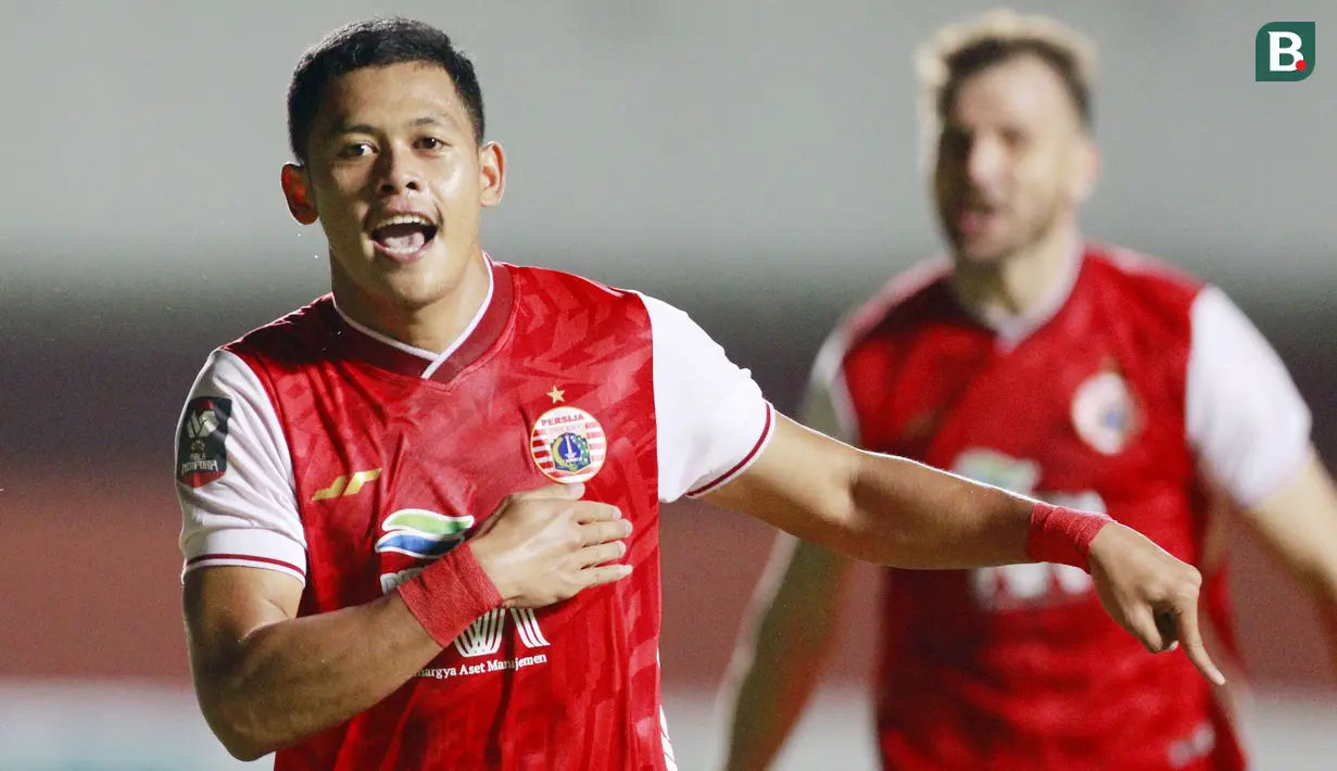 Pemain Persija Jakarta, Taufik Hidayat, melakukan selebrasi usai mencetak gol ke gawang melawan Persib Bandung pada laga Final leg pertama Piala Menpora 2021 di Stadion Maguwoharjo, Sleman, Kamis (22/4/2021). (Bola.com/M Iqbal Ichsan)
