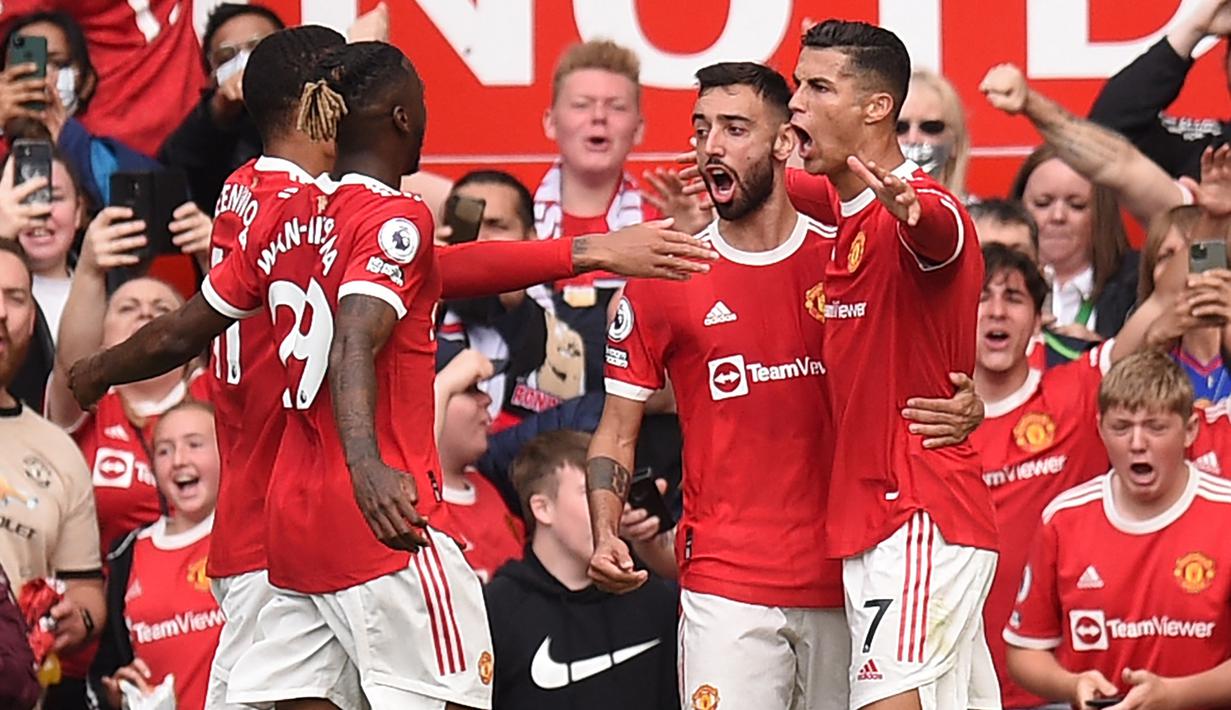 Termasuk dua golnya saat Manchester United menang 4-1 atas Newcastle United (11/9/2021), Cristiano Ronaldo telah mencetak 86 gol bersama Setan Merah di Liga Inggris. The Magpies pun tercatat sebagai satu dari lima tim yang paling sering dijebol CR-7. Yang lain? (Foto: AFP/Oli Scarff)