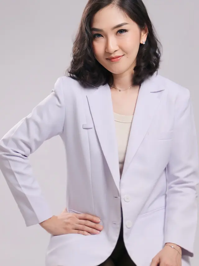 Dr Ria Anita