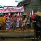 Kothekan lesung sebagai refleksi menjaga bumi dengan gembira. (foto: Liputan6.com/edhie prayitno ige)