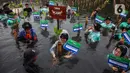 Dalam rangka memperingati Hari Pohon Sedunia yang jatuh pada 21 November lalu, Badan Pengelola Keuangan Haji (BPKH) melakukan kegiatan penanaman 1.000 pohon mangrove. (Liputan6.com/Angga Yuniar)
