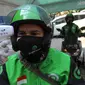 Mitra Gojek saat diukur suhu tubuh pada aksi J3K (Jaga Kesehatan-Jaga Kebersihan-Jaga Keamanan) dalam rangka Hari Perhubungan Nasional di Kota Depok, Jawa Barat, Jumat (18/8/2020). (Liputan6.com/HO/Ading)