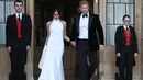 "Aku harap Harry dan Meghan bisa mendapatkan bulan madu yang menyenangkan, bisa rileks dan istirahat," ujar Thomas. (STEVE PARSONS  POOL  AFP)