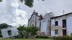 Kerusakan pada Gereja Sta Maria de Mayan setelah gempa kembar berkekuatan magnitudo 5,4 dan 5,9 di Itbayat on Pulau Batanes, Filipina (27/7/2019). Delapan orang tewas dan belasan lainnya cedera akibat gempa kembar tersebut. (AFP Photo/Dominic De Sagon Asa)
