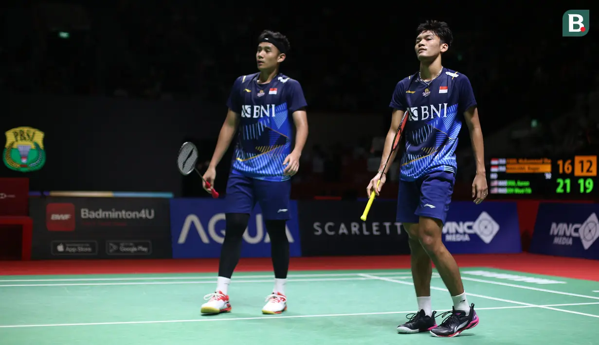 <p>Ganda putra Indonesia, Muhammad Shohibul Fikri/Bagas Maulana saat menghadapi ganda putra Malaysia, Aaron Chia/Soh Wooi Yik pada laga babak 32 besar Kejuaraan bulu tangkis Indonesia Open 2023 di Istora Senayan, Jakarta, Rabu (14/6/2023). Muhammad Shohibul Fikri/Bagas Maulana kalah dua game langsung 16-21, 12-21. (Bola.com/Bagaskara Lazuardi)</p>