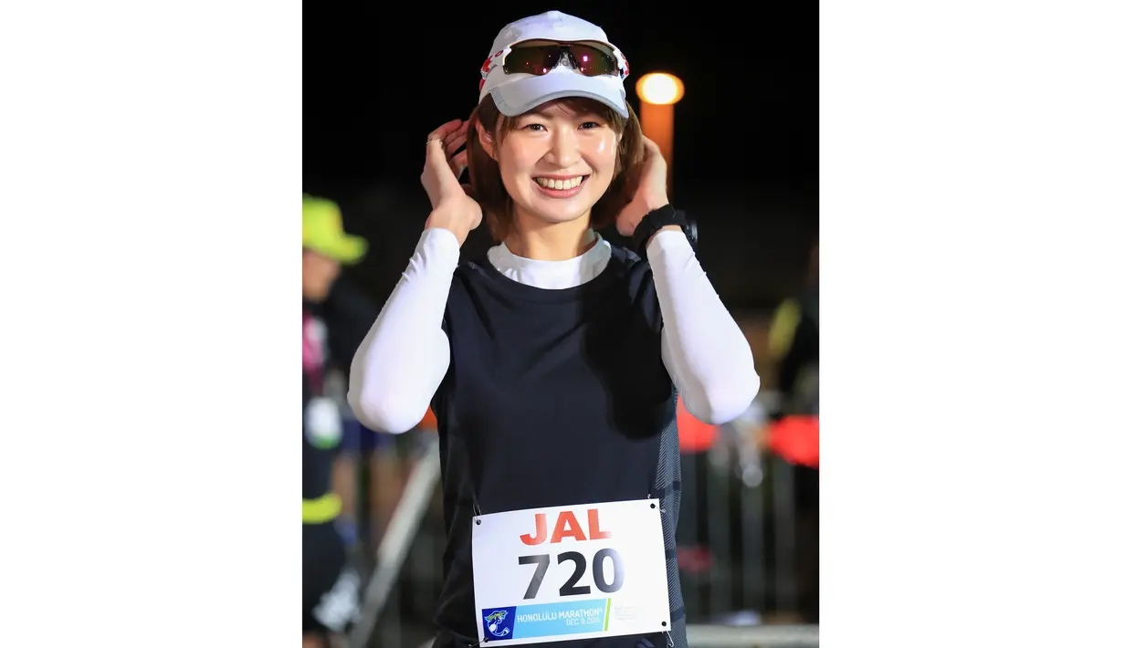 Pevoli wanita asal Jepang, Saori Kimura saat mengikuti Honolulu Marathon 2018 (9/12/2018). (Getty Imagesfor HONOLULU MARATHON/AFP/Tom Pennington)