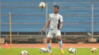 Munhar saat memperkuat Arema FC pada 2013. (Bola.com/Iwan Setiawan)