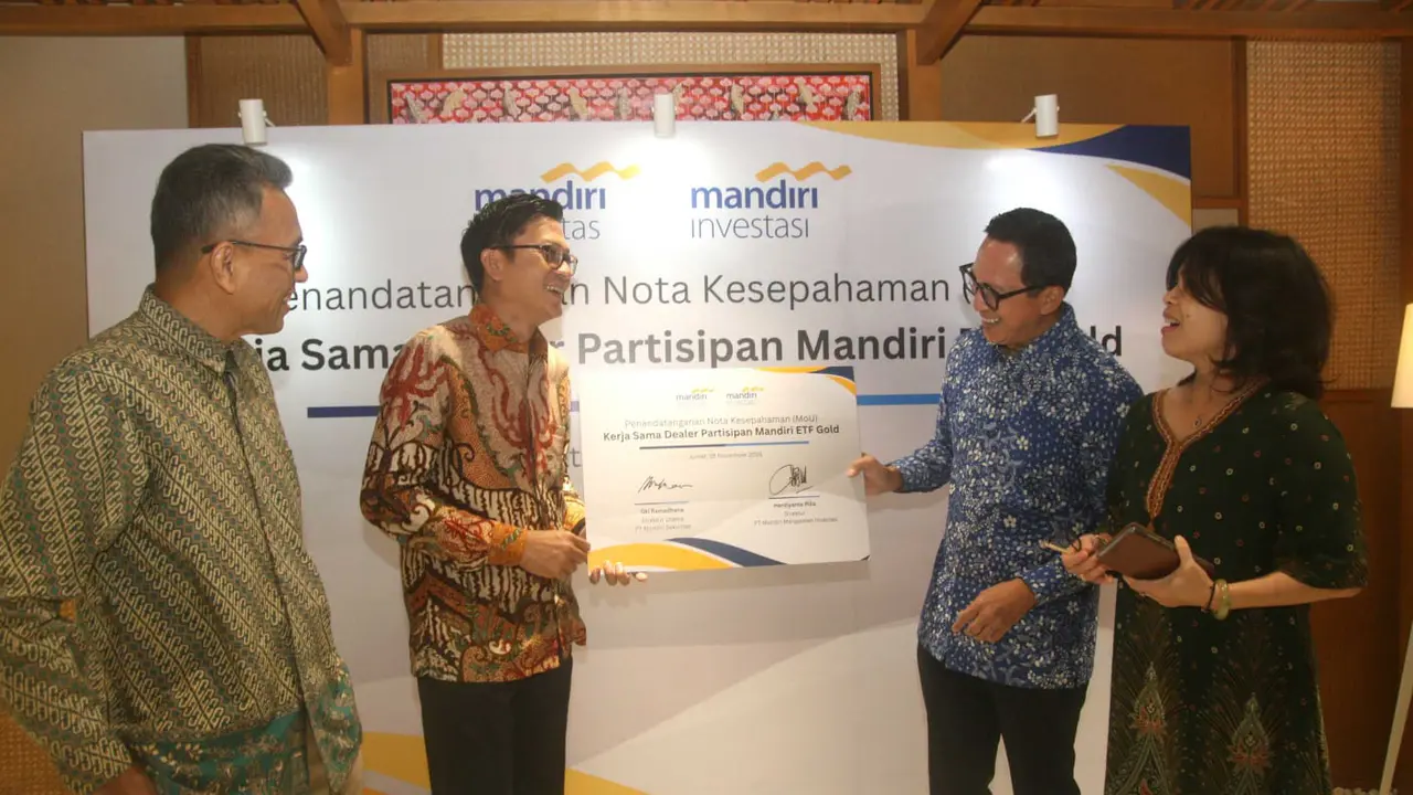 Mandiri Investasi melakukan penandatanganan nota kesepahaman (MoU) dengan Mandiri Sekuritas